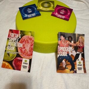 Zumba Fitness Step with 3 workout dvd’s, program guide, & nutrition booklet